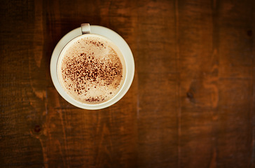 Image showing Top view wooden table, coffee cup or mock up cafe store, restaurant or diner for beverage service, drinks or espresso. Hospitality, fresh caffeine mug and desk space with morning hot chocolate latte