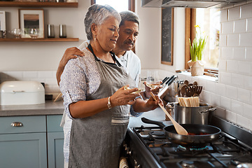 Image showing Love, cooking pan and old man with happy woman at oven in kitchen, embrace and healthy marriage bonding in home. Happiness, help and food, senior couple with smile, frying and dinner in retirement.