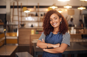 Image showing Coffee shop, happy barista and portrait of woman in cafe for service, working and crossed arms. Small business owner, restaurant and professional female waitress smile in cafeteria ready to serve