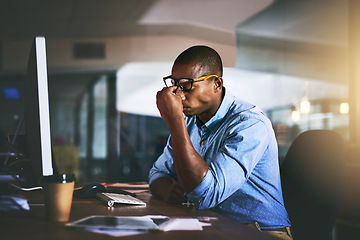 Image showing Black business man, stress and headache in night, office and fatigue by computer for project deadline. African businessman, burnout or anxiety in workplace by pc, web design startup and mental health