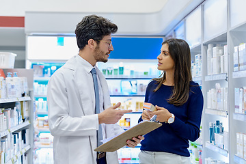 Image showing Pharmacy, medicine and pharmacist talking to customer while working in a retail store. Professional man in pharmaceutical or medical industry for service, healthcare and advice for a woman client