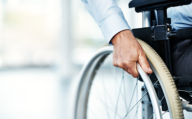 Image showing Wheelchair, person with disability and hand in a hospital for healthcare and support. Patient, mobility access and male adult in a clinic for supporting and medical care with hands and mockup space