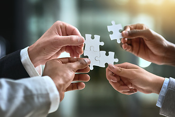 Image showing Puzzle, business hands and group of people for solution, teamwork and goals, integration or workflow success. Team building, games and development of person problem solving, synergy or collaboration