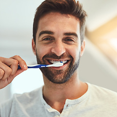 Image showing Cleaning, portrait and brushing teeth with man in bathroom for dental, morning routine and oral hygiene. Smile, cosmetics and health with person and toothbrush at home for self care, breath and mouth