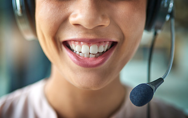 Image showing Happy woman, teeth and smile in call center with headphones for customer service or telemarketing. Closeup of friendly female person or consultant agent mouth smiling with headset mic to contact us