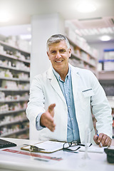 Image showing Senior man, portrait and pharmacist handshake for greeting, introduction or hello in healthcare pharmacy. Happy elderly male person, medical professional or shaking hands for trust, welcome or advice