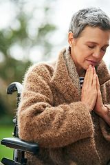 Image showing Senior woman in wheelchair, prayer outdoor with worship and God with peace, religion with gratitude and faith. Spiritual female person with disability in nature, praying for guidance while in garden