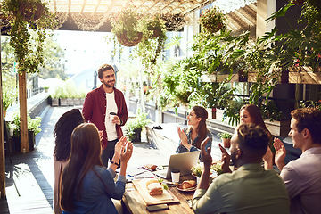 Image showing Presentation, restaurant and business people applause in meeting for discussion, planning and collaboration. Coffee shop, winning and men and women at lunch for team building, achievement or teamwork