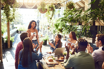 Image showing Restaurant, meeting and woman with business people applause for lunch discussion, planning and presentation. Cafe, teamwork and men and women celebrate for team building, collaboration or achievement