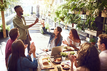 Image showing Applause, restaurant and happy business people in lunch meeting for discussion, planning and victory. Cafe, teamwork success and men and women clapping for winning, collaboration and achievement