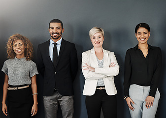 Image showing Diversity, support and portrait of business people in studio for smile, community and teamwork. Happy, collaboration and professional with employees and wall background for confidence and mission