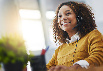 Image showing Young african woman, call center agent or listen on voip headset with mockup space, lens flare or contact. Girl, customer service or tech support crm with smile, headphones or microphone at help desk