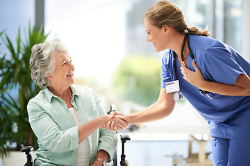 Image showing Handshake, nurse and senior advice in wheelchair with medical results and surgery success news. Hospital, healthcare and clinic with women and nursing staff with care and support of elderly person