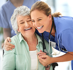 Image showing Nurse, senior woman and happy hug of caregiver and smile with support and care in hospital. Wheelchair, patient and healthcare employee help person with a disability with love in a health clinic