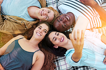 Image showing Friends, top view and picnic with circle selfie, happiness or diversity for social media post, app or blog. Men, woman and students for photography, profile picture or solidarity with lying on ground