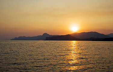 Image showing Sunset over the sea and mountains. Ukraine. Coast of Crimea.