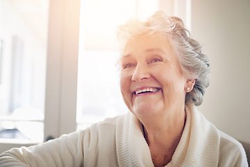 Image showing Relax, happy and smile with old woman on sofa for free time, retirement and weekend. Lens flare, happiness and mindset with senior person in living room at home for elderly, positive and carefree