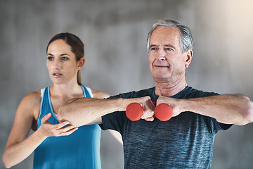 Image showing Coaching, dumbbell and fitness with old man and personal trainer for support, health and physiotherapy. Training, weights and senior patient workout with woman, physiotherapist and help for exercise