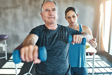 Image showing Physical therapy, dumbbell and support with old man and personal trainer for fitness, health and physiotherapy. Training, weightlifting and coaching with senior patient and physiotherapist for help