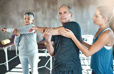 Image showing Stretching, physiotherapy and old man with personal trainer for fitness, wellness or rehabilitation. Health, workout or retirement with senior patient and physiotherapist in gym for warm up training