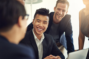 Image showing Business meeting, happy people and manager with group for job review, feedback and discussion or teamwork. Corporate, professional or man talking to employees for news, advice and planning on laptop