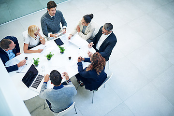 Image showing Top view, group and staff in a meeting, finance and planning for budget, investment and schedule. Business people, men or women share ideas, trading and stock market feedback, report and conversation