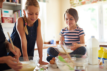 Image showing Mother, teamwork or happy kids baking in kitchen as a family with siblings learning cookies recipe at home. Girl, baker or mom helping or teaching children to bake in stove for child development