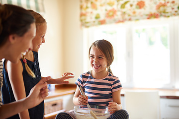 Image showing Mother laughing, happy family or kids baking in kitchen with siblings learning or mixing cookies recipe. Funny, home or mom helping or teaching playful children to bake together for cooking skills