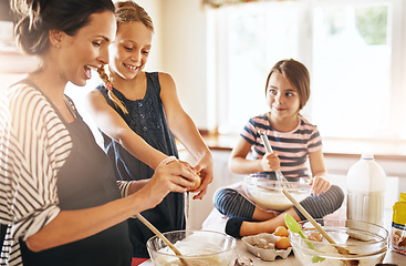 Image showing Happy mother, family or kids baking in kitchen with siblings learning cookies recipe or mixing pastry at home. Mom, cooking or baker helping or teaching children to bake together for development