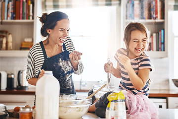 Image showing Mother, play or kid baking in kitchen as a happy family with an excited girl laughing or learning cookies recipe. Playful, flour or funny mom helping or teaching kid to bake for development at home