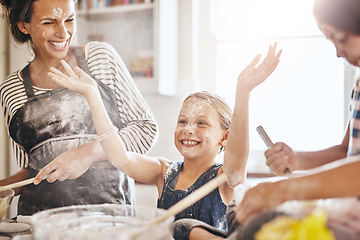 Image showing Messy, happy and children baking with mother for teaching and being crazy with flour. House, excited and girl kids with a mom, learning to cook and making a mess while cooking together in the kitchen