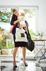 Image showing Busy, talking and a mother on a phone call with a baby, communication and groceries. Family, multitask and a mom holding a child while speaking on mobile and walking into a house after work together