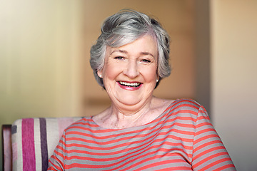 Image showing Portrait, happy and senior woman in nursing home, relax in living room or smile in retirement. Elderly lady, happiness and healthy grandmother laughing at funny, joke or freedom of retired life