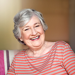 Image showing Portrait, senior woman and smile in nursing home, living room or relax in retirement and happy in house. Elderly, happiness and healthy person laughing at funny, joke or freedom of retired life