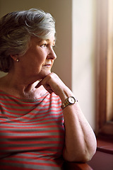 Image showing Senior woman, worried and think at window for memory, idea or home on living room sofa. Elderly lady, remember and thinking for decision, depression or retirement with fear, anxiety and lounge chair