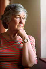 Image showing Senior woman, worried and thinking at window for memory, ideas or home on living room sofa. Elderly lady, remember and think for decision, mental health or retirement on lounge chair, fear or anxiety