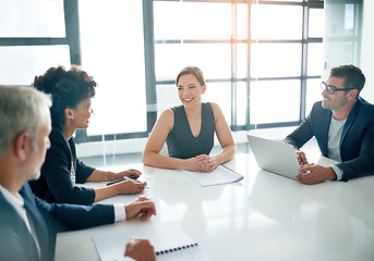 Image showing Business people in meeting, collaboration and planning with project management, laptop and paperwork in conference room. Diversity, happy with teamwork and men with women in strategy discussion