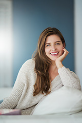 Image showing Portrait, happy and woman relax on sofa in home living room for easy lifestyle. Face, smile or young female person from Canada on couch in lounge, apartment or house to enjoy me time, break or mockup