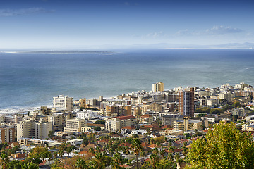 Image showing City, ocean and urban buildings with architecture, infrastructure and development for property expansion. Skyline, metro cbd and outdoor with cityscape, skyscraper and sea with space in Cape Town