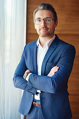 Image showing Business, portrait of businessman with arms crossed and standing in his office, Confident or proud, ceo management or mature manager and professional corporate man stand in modern workplace