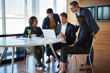 Image showing Discussion, brainstorming and business people in the office with laptop for corporate planning. Teamwork, meeting and group of professional employees working on project in collaboration in workplace.