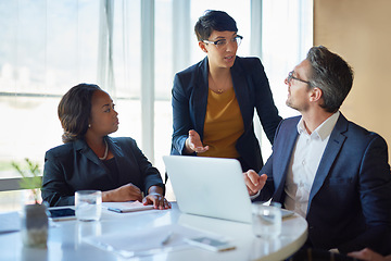 Image showing Business, meeting and people in training or working in corporate, discussion with speaker or management. Leadership, team and collaboration on computer or planning, strategy and brainstorming