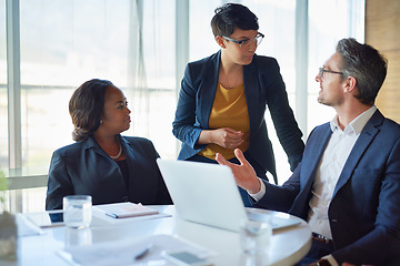 Image showing Meeting, business and people in conversation or working in corporate, legal discussion or lawyer in partnership. Leadership, team and training on computer or planning, strategy and management