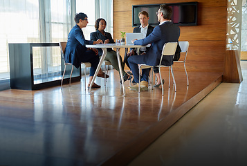 Image showing Professional, teamwork and conversation with strategy in conference room with manager at office. Discussion, business and group with meeting or brainstorming or planning at company for project.