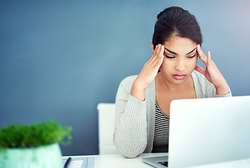 Image showing Business woman, headache and pain with laptop, office and hands for mistake, anxiety or stress at startup. Young businesswoman, burnout and pain with fatigue, frustrated and glitch on pc in workplace