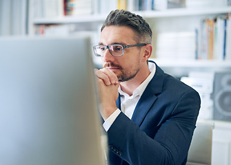 Image showing Ceo, employee and man with focus, reading email and consultant in a workplace, research and search internet. Male person, entrepreneur or mature agent with a pc, concentration and website information