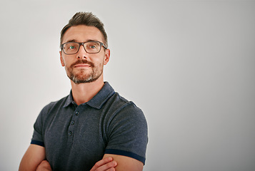 Image showing Mature man, thinking and gray wall background with ideas, brainstorming and glasses with mockup space. Guy, focus and arms crossed with idea, mindset and smile for vision, pride or career by backdrop