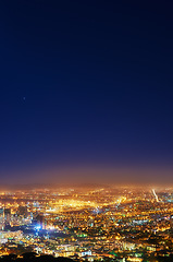 Image showing Night, sky and city with lights, buildings and Cape Town with view, traffic and urban development. Future, cloud and industry with growth, transportation and landscape with streets, dark and travel
