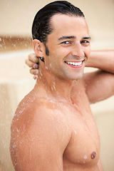 Image showing Man, shower and water drop with smile, portrait and bathroom for hygiene, self care and morning for skin routine. Young guy, body cleaning and healthy for skincare, wellness or happiness in apartment