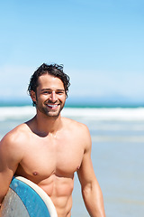 Image showing Portrait, surfboard and shirtless man at the beach, ocean and smile for summer vacation, tropical fun and holiday. Happy surfer, muscular male and guy surfing at sea with mockup space on blue sky